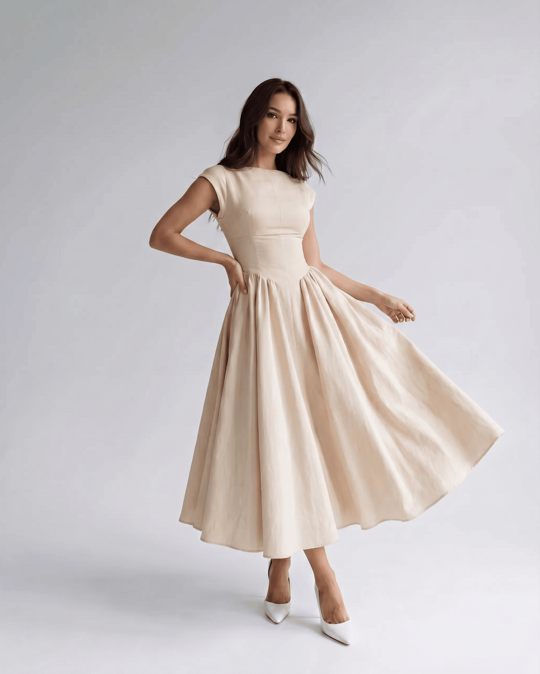 Sleeveless A-line party dress for women, an elegant midi length with a flattering gathered waist.