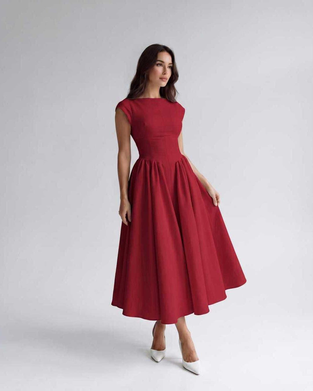 Elegant women's sleeveless A-line midi dress, suitable for formal events & chic occasion wear.