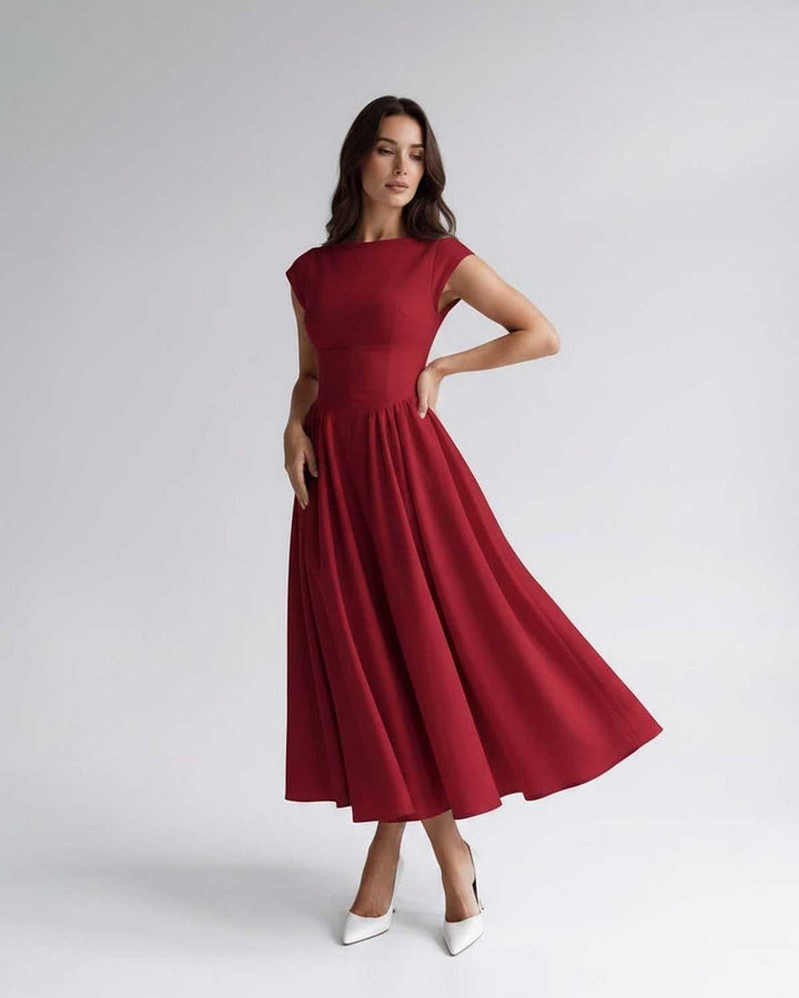 Chic A-line midi dress for women, sleeveless and elegant, featuring a stylish gathered waistline.