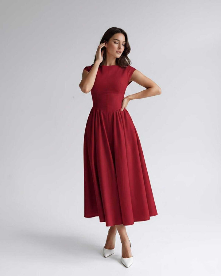 Women's elegant sleeveless A-line formal dress, a stunning midi length for evening occasion wear.