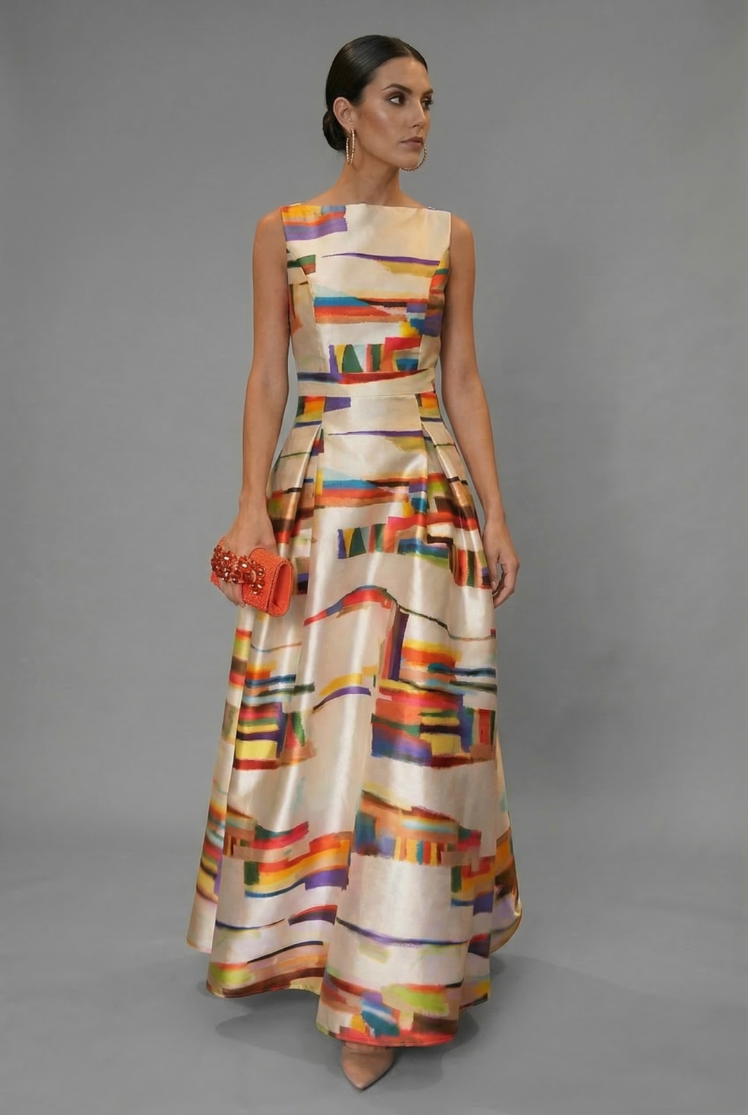 Sophisticated sleeveless maxi dress, ideal women's party wear or special occasion evening gown with elegant print.