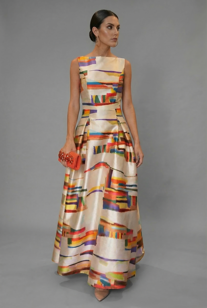 Sophisticated sleeveless maxi dress, ideal women's party wear or special occasion evening gown with elegant print.