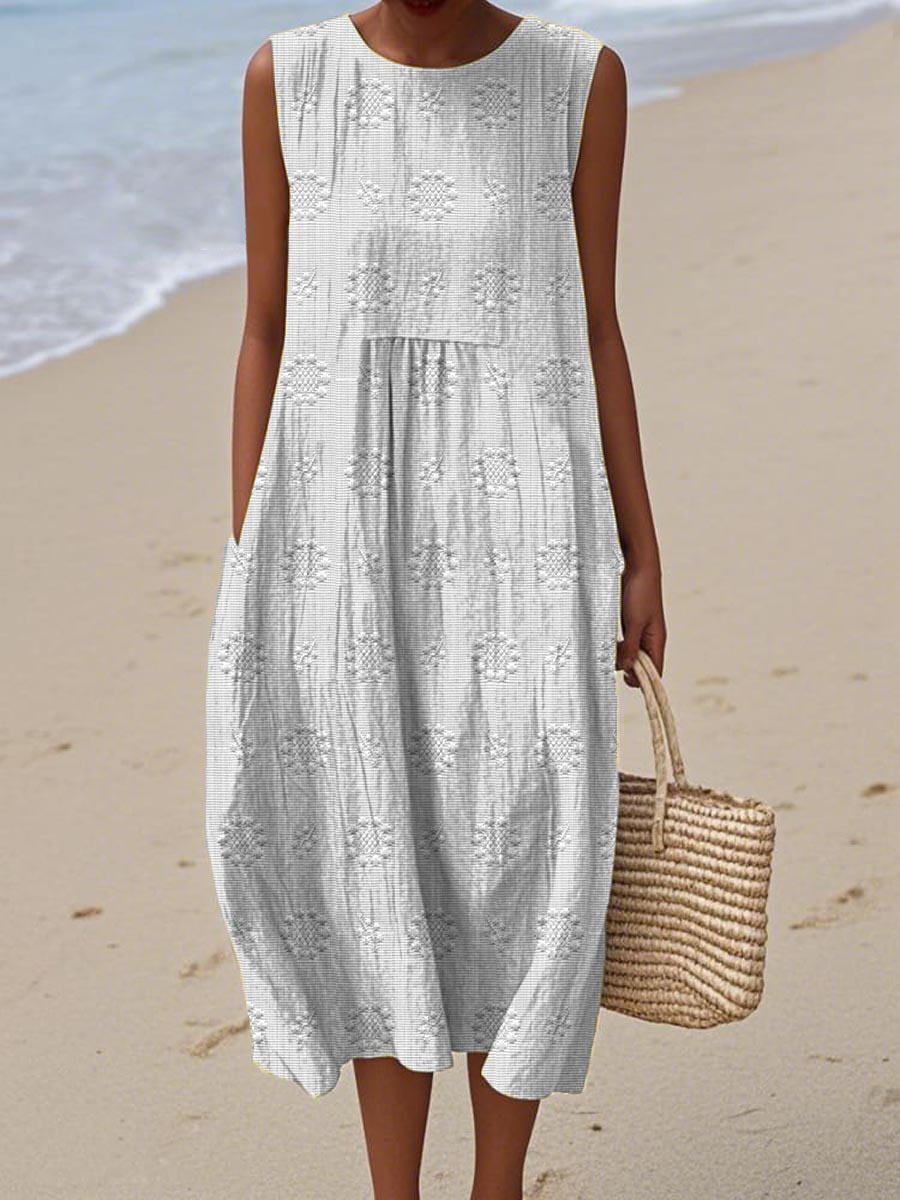 Comfortable women's casual midi dress for summer. Sleeveless design with useful pockets for everyday wear.