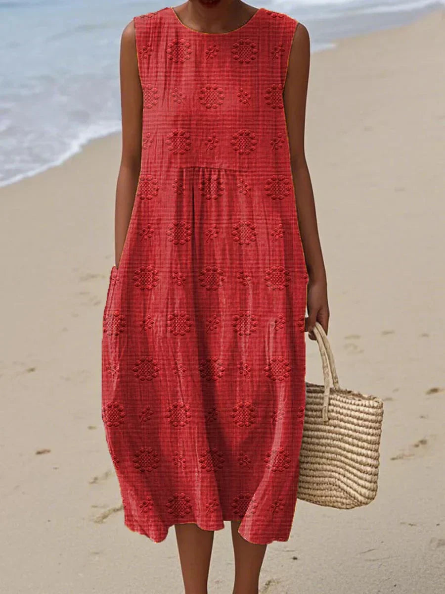 Ladies' elegant fashion midi dress, sleeveless, featuring beautiful embroidery & practical side pockets.