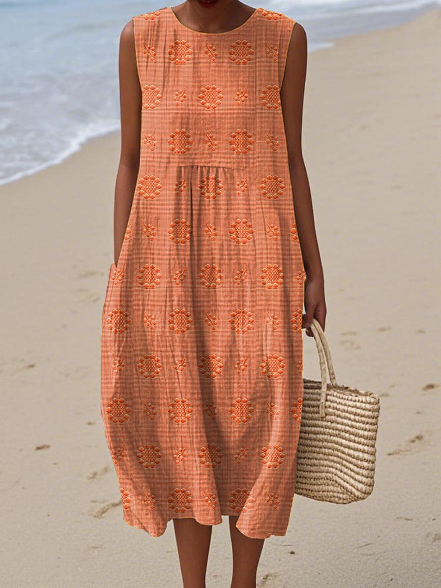Stylish women's summer midi dress with a flowy silhouette, elegant embroidery, sleeveless cut, & pockets.