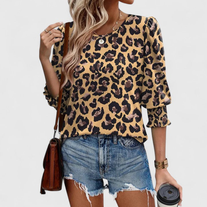 Smocked long sleeve top for women. Elegant & versatile for layering, relaxed fit, perfect for any season.