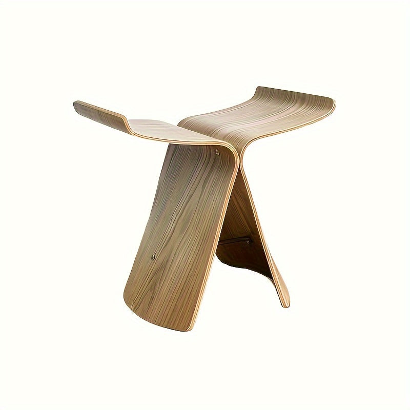 Elegant solid wood butterfly stool in rich walnut finish for living room.