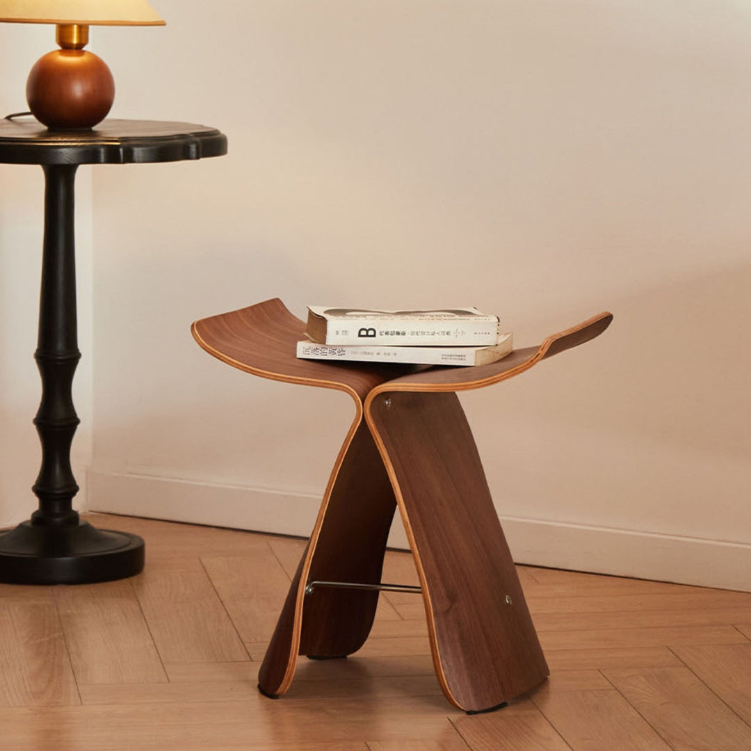 Solid wood butterfly stool, modern accent furniture for entryway seating.