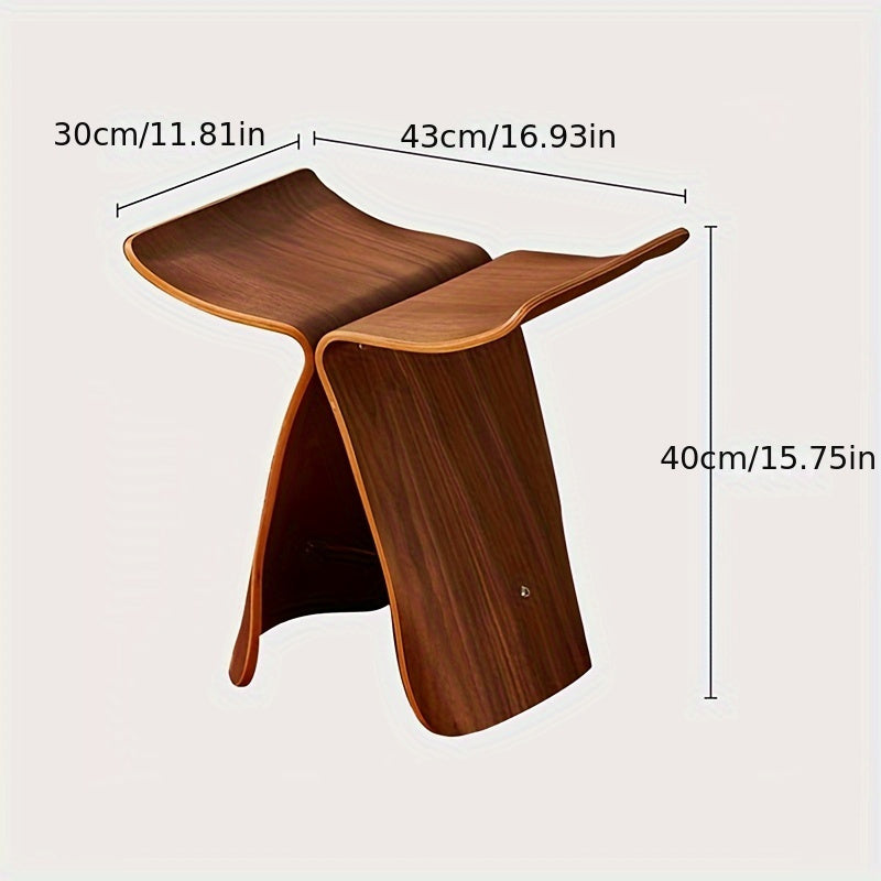 Compact butterfly stool, perfect small wood furniture for living room entrance.