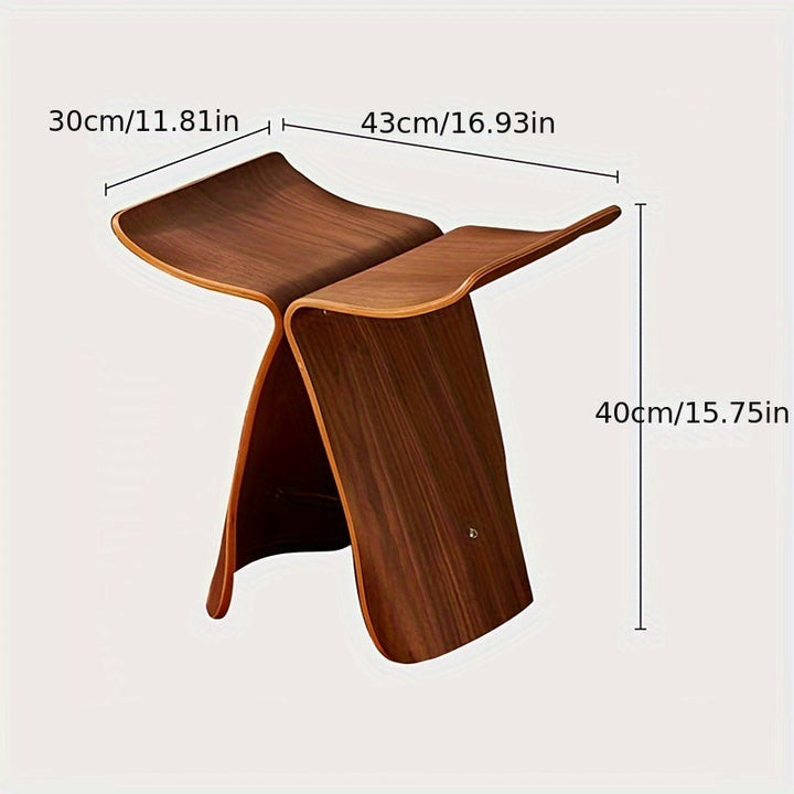 Compact butterfly stool, perfect small wood furniture for living room entrance.