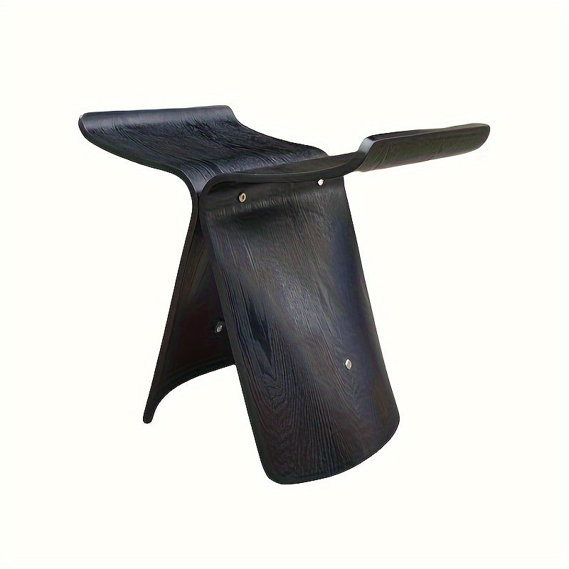 Handcrafted solid wood butterfly stool, adding warmth to your home decor.