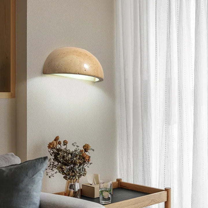 Contemporary stone LED wall lamp for living room, bedroom, or hallway. Modern accent lighting.