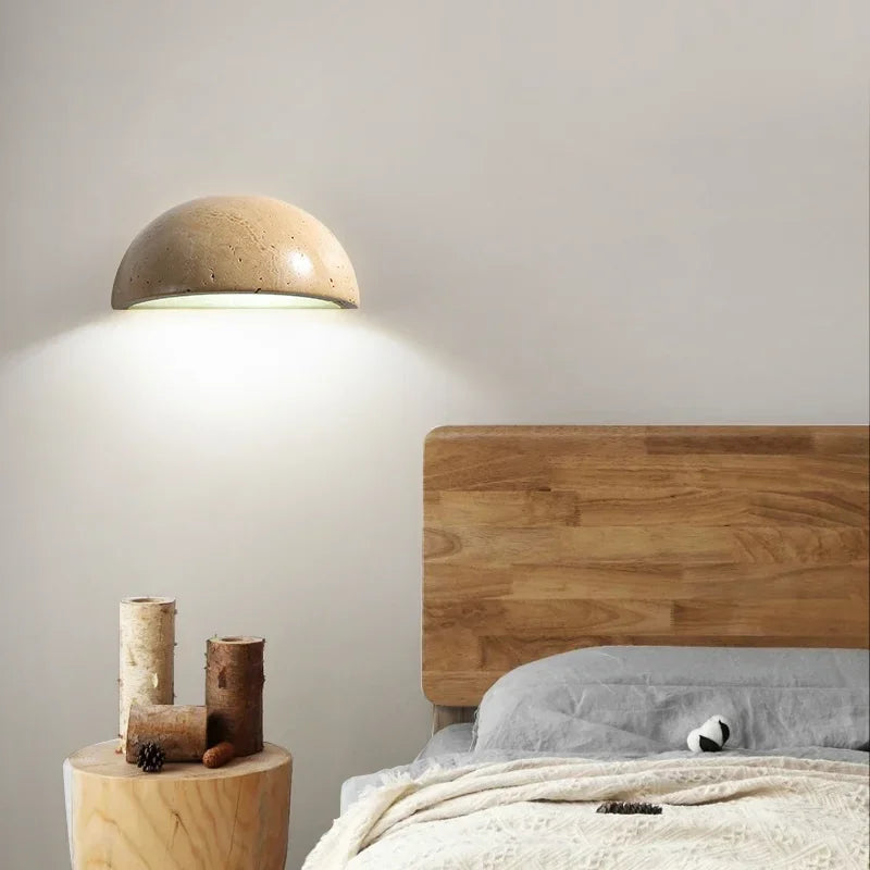 Natural stone LED wall light fixture, offering soft, modern ambient lighting for interior design.