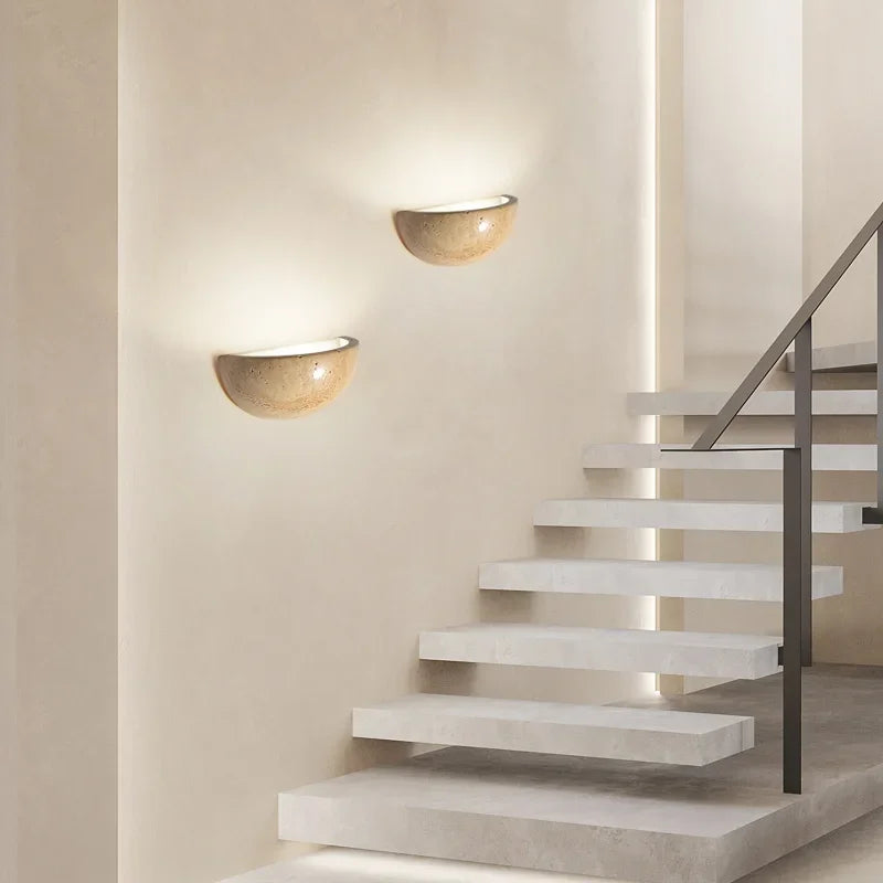 Sleek, elegant stone LED wall sconce. Energy-efficient modern lighting for contemporary home decor.