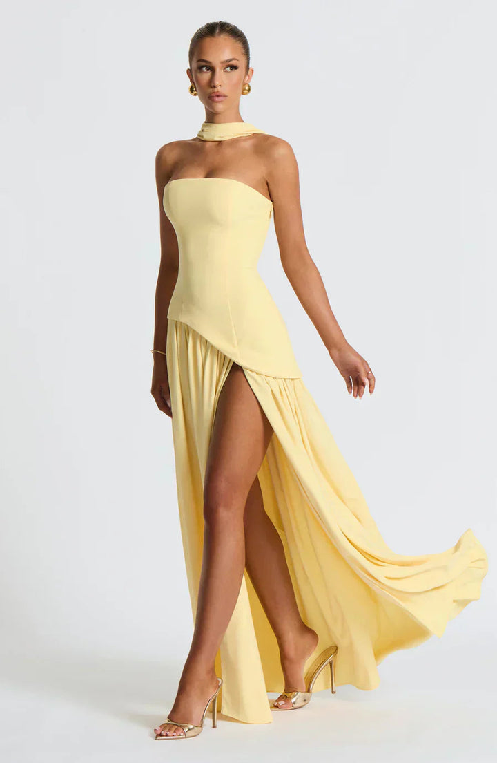 Elegant strapless maxi dress for women with a high slit & asymmetric hem, perfect for evening events.