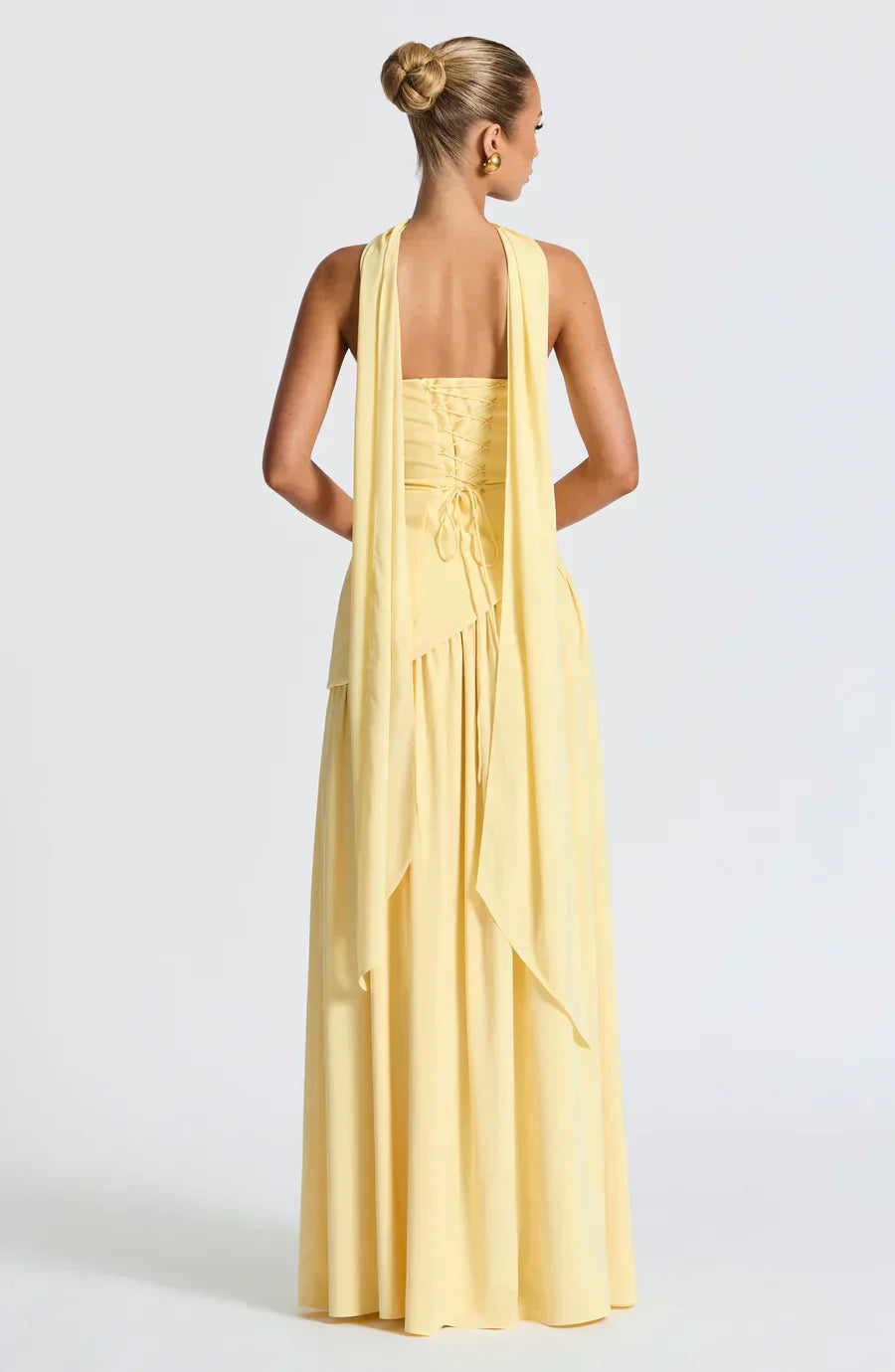 Women's formal strapless maxi gown featuring a stylish high slit, ideal for special occasions.