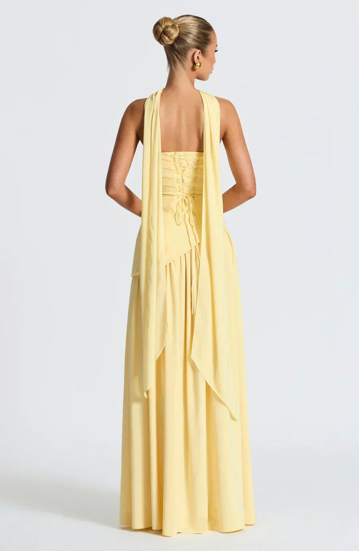 Women's formal strapless maxi gown featuring a stylish high slit, ideal for special occasions.