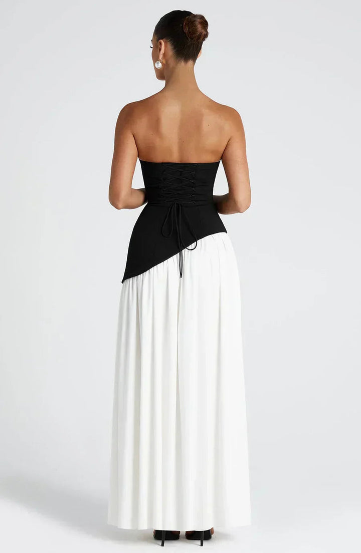 Long elegant strapless evening gown with a flattering high slit for women.
