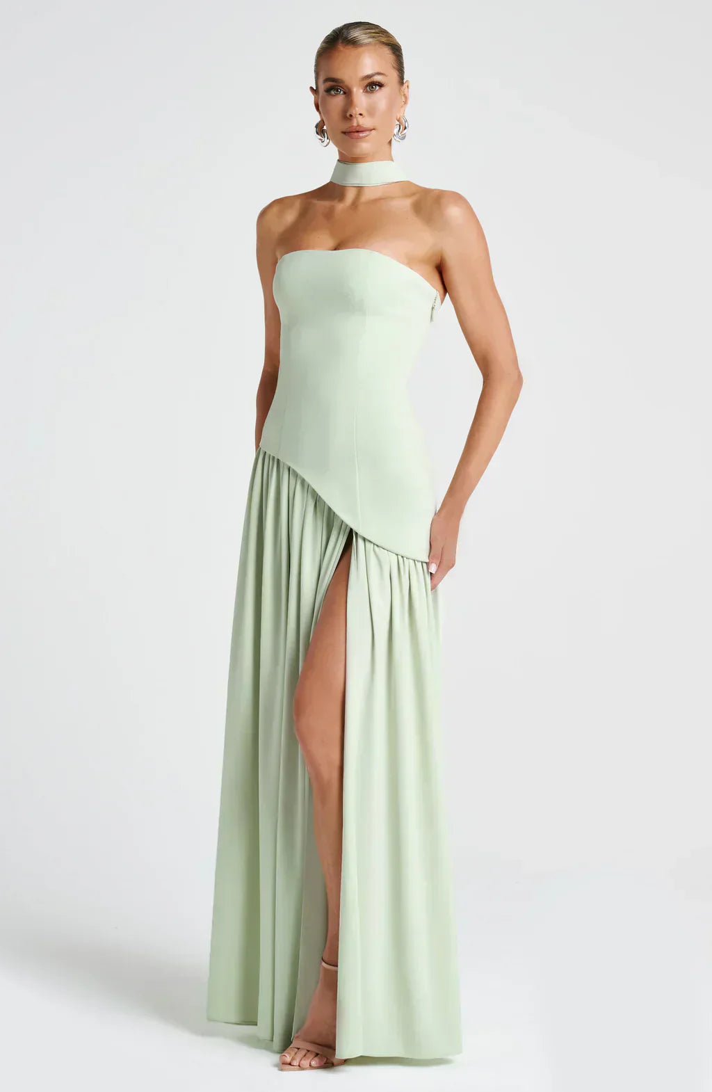 Party-ready strapless maxi dress with a bold high slit, an elegant choice for women.