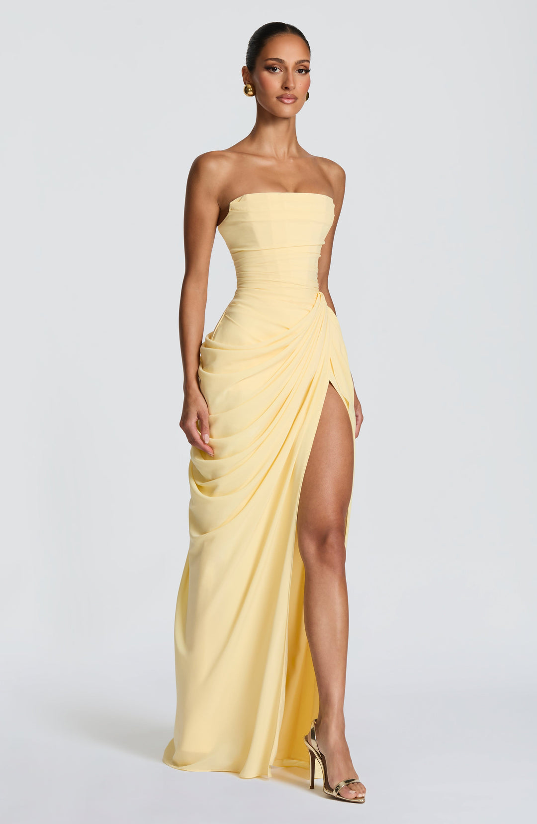 Women's elegant strapless gala gown, corset bodice, draped maxi dress for special occasions.
