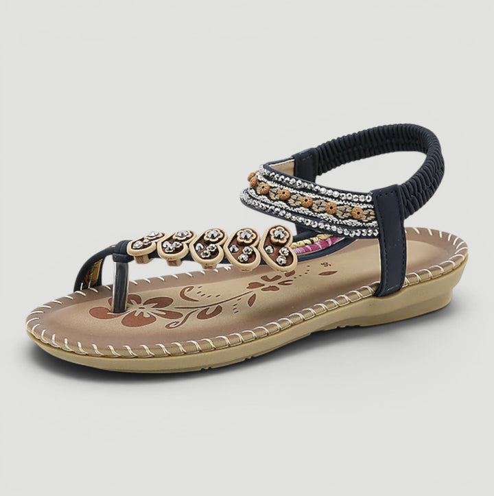 Front view of elegant women's t-strap orthopedic sandals, designed for comfortable all-day beach wear.