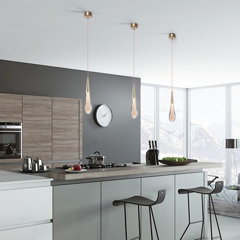 Modern LED teardrop crystal pendant light, sophisticated home interior lighting for hallways.