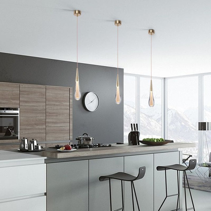 Modern LED teardrop crystal pendant light, sophisticated home interior lighting for hallways.