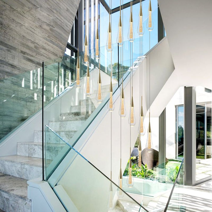 Contemporary teardrop crystal chandelier, stunning LED pendant light for modern home decor.