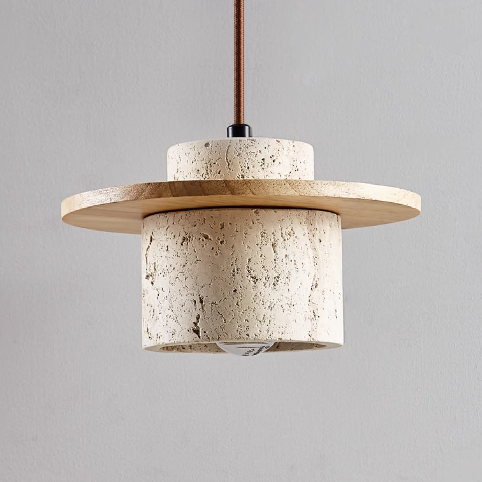 Close-up of a modern travertine pendant lamp, highlighting its natural stone texture and sophisticated wood accents.