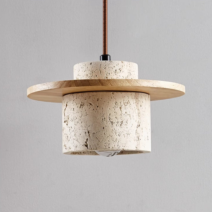 Close-up of a modern travertine pendant lamp, highlighting its natural stone texture and sophisticated wood accents.