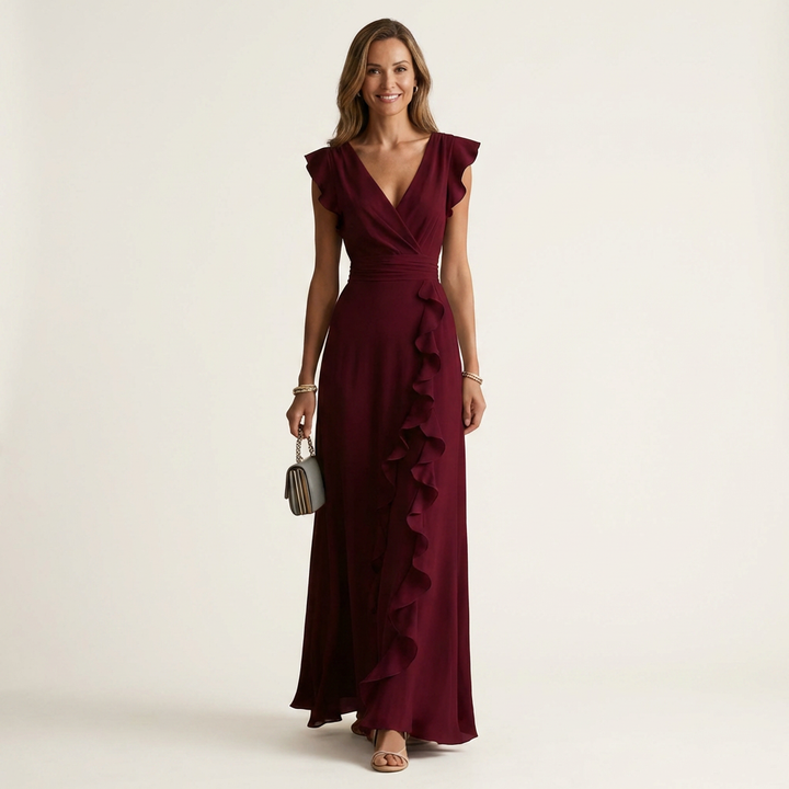 Stylish flutter sleeve V-neck maxi dress with elegant ruffles, ideal for women's evening wear.