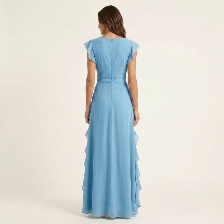 Flattering V-neck flutter sleeve maxi dress with elegant ruffles, enhancing a woman's silhouette.