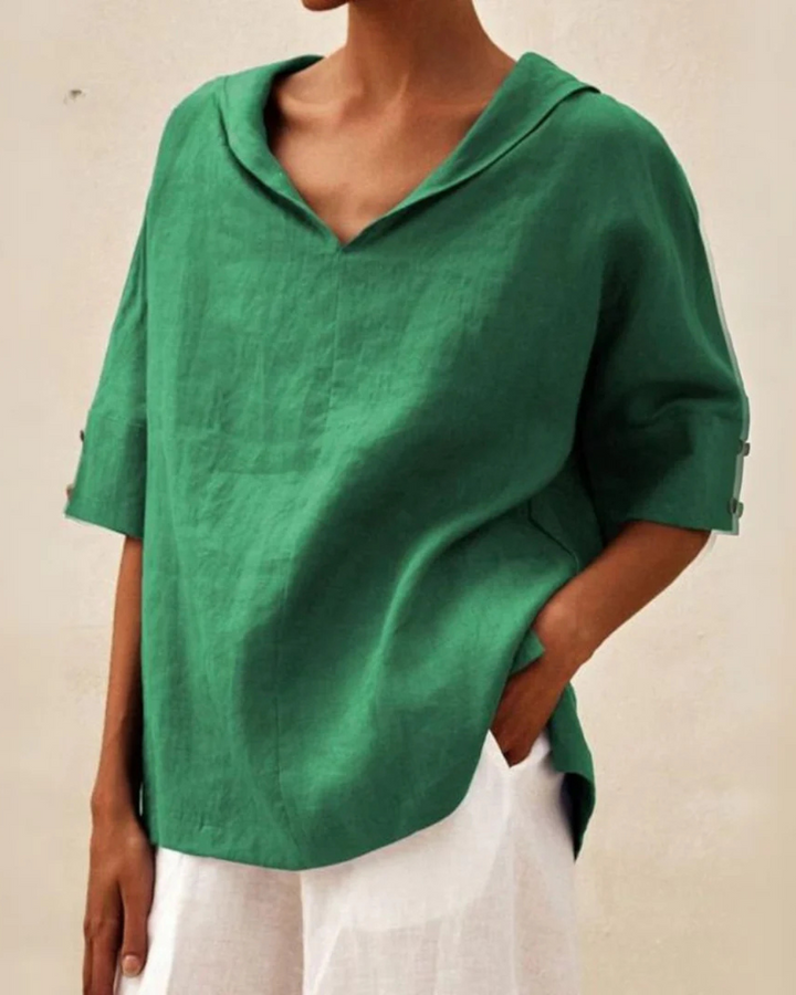 Elegant V-neck half sleeve blouse for women, perfect for spring/summer chic style & versatile everyday fashion.