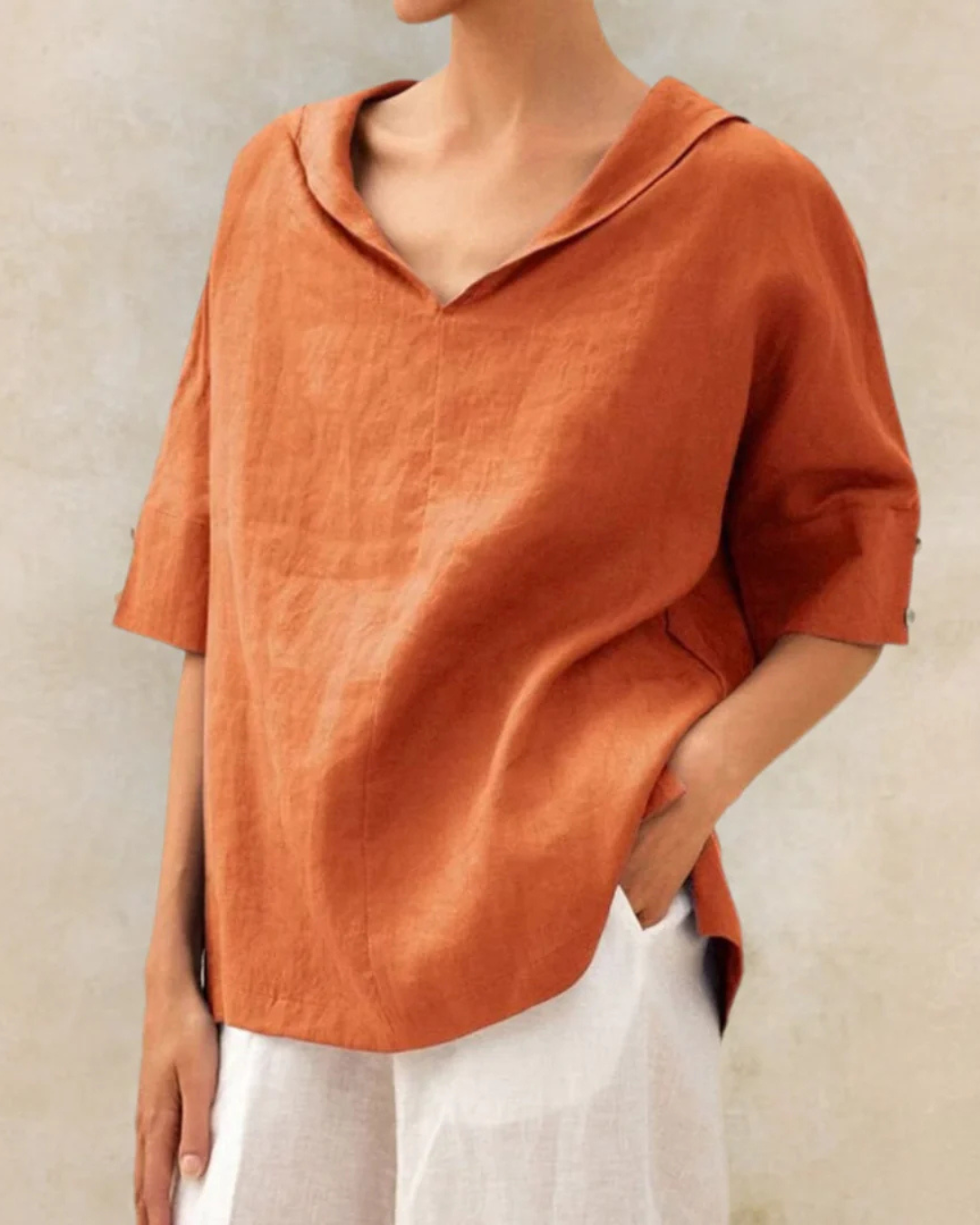Women's V-neck half sleeve summer blouse, elegant & comfortable for spring fashion and versatile casual wear.