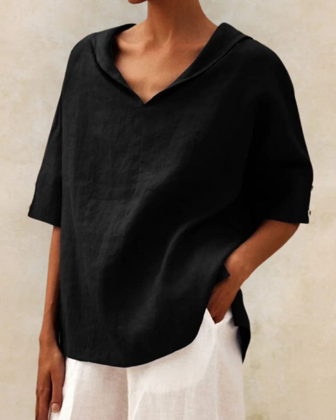 Elegant women's V-neck half sleeve shirt, versatile and chic for spring fashion, casual & everyday wear.