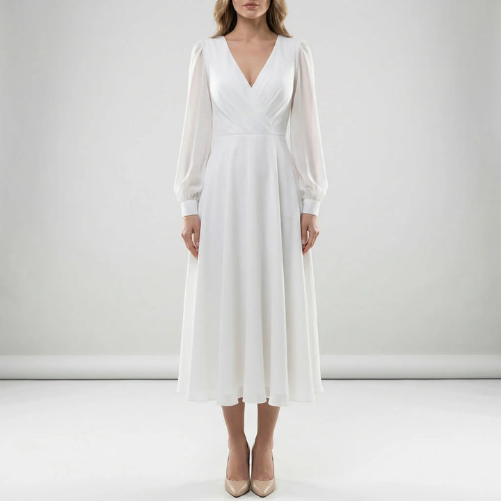 Elegant V-neck long sleeve A-line wedding dress with flowing skirt