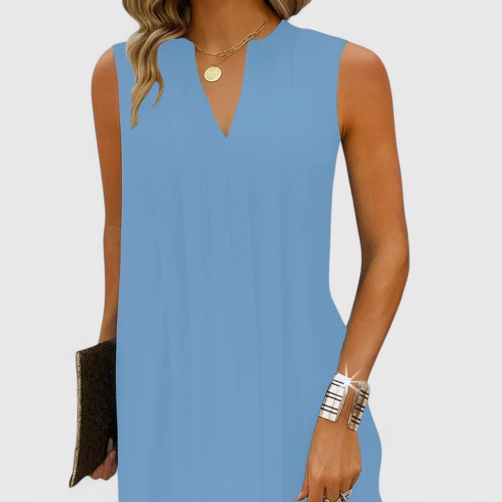 Chic women's midi V-neck dress, flattering for day to night, suitable for work or leisure.