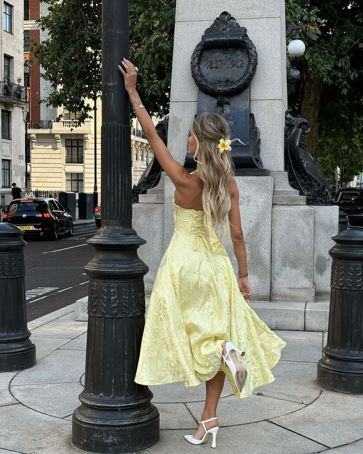 Sophisticated women's V-neck midi dress. Elegant wedding guest attire, perfect for special occasions & summer events.
