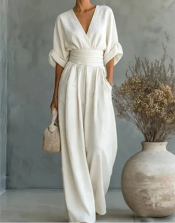 Effortless elegance: women's V-neck wide-leg jumpsuit, a perfect summer fashion statement.