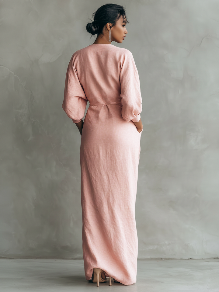 Pink V-neck wrap maxi dress for women. Effortless style, relaxed fit, and elegant for smart casual occasions.
