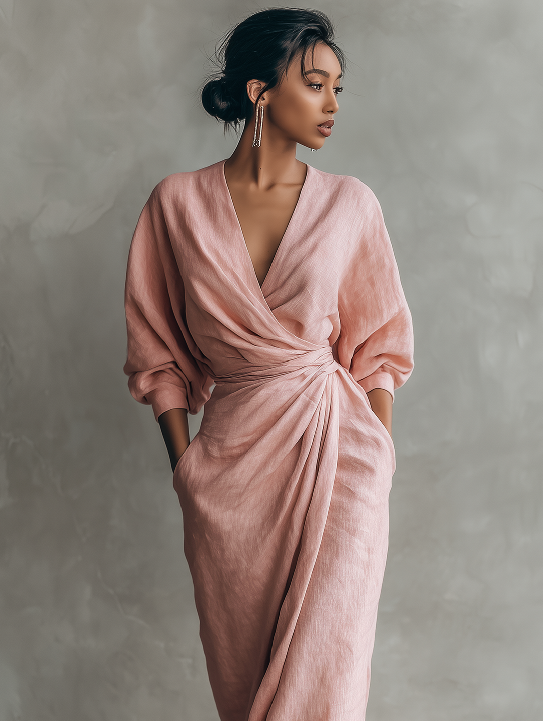Brown wrap maxi dress with V-neck & three-quarter sleeves. Relaxed fit & elegant, ideal for all-season women's fashion.