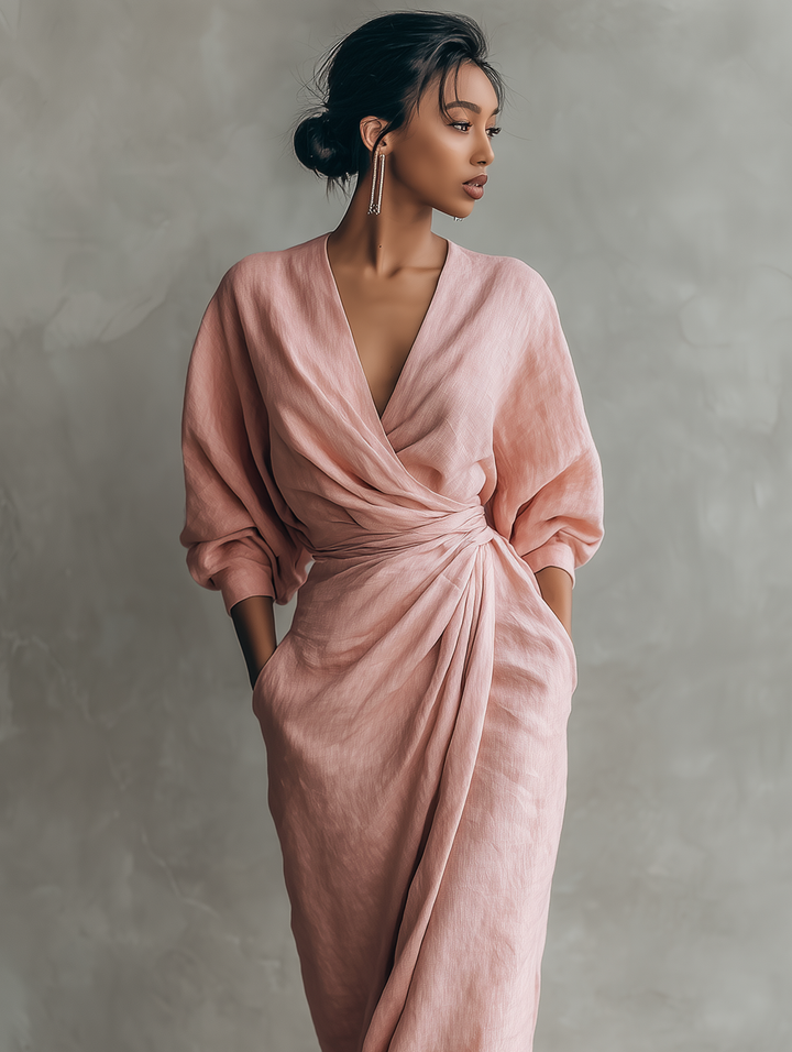 Brown wrap maxi dress with V-neck & three-quarter sleeves. Relaxed fit & elegant, ideal for all-season women's fashion.