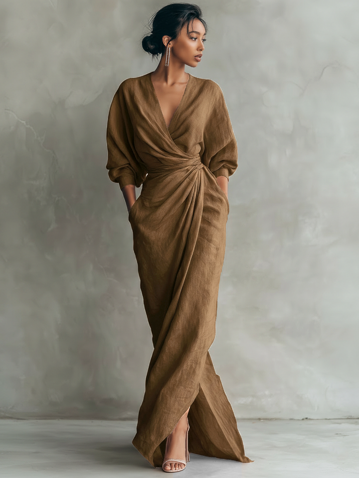 Women's effortless pink wrap maxi dress. Features a flattering V-neck, relaxed fit, and elegant for any occasion.