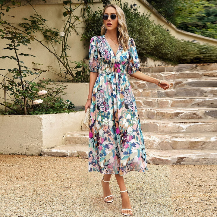 Feminine vintage midi dress, exuding timeless charm. An elegant choice for classic women's fashion.