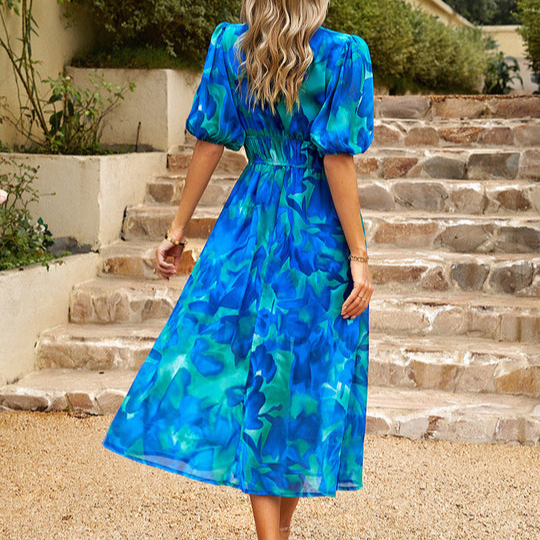 Elegant women's midi dress with vintage style. A charming and stylish choice for special occasion wear.