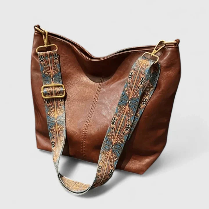 Large capacity women's everyday shoulder bag. Chic elegant handbag perfect for daily use and travel.