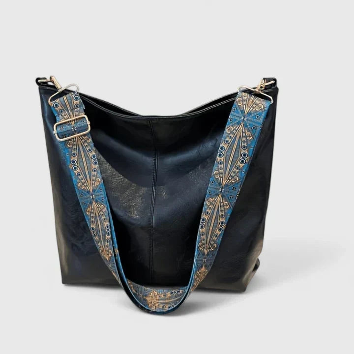Sophisticated women's crossbody shoulder bag. Vintage-style fashion accessory ideal for daily elegant use.