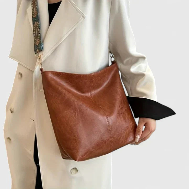 Women's sophisticated shoulder bag. A stylish large capacity handbag, perfect for everyday elegant fashion.