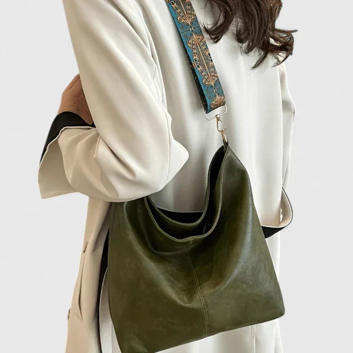 Everyday women's elegant shoulder bag. Vintage-style handbag and fashion accessory for sophisticated daily carry.