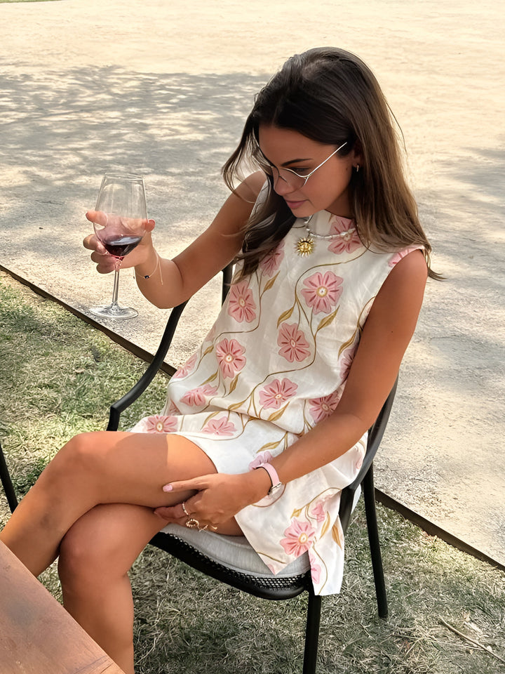 Elegant white A-line sleeveless midi dress for women, perfect for summer events & vacation style.